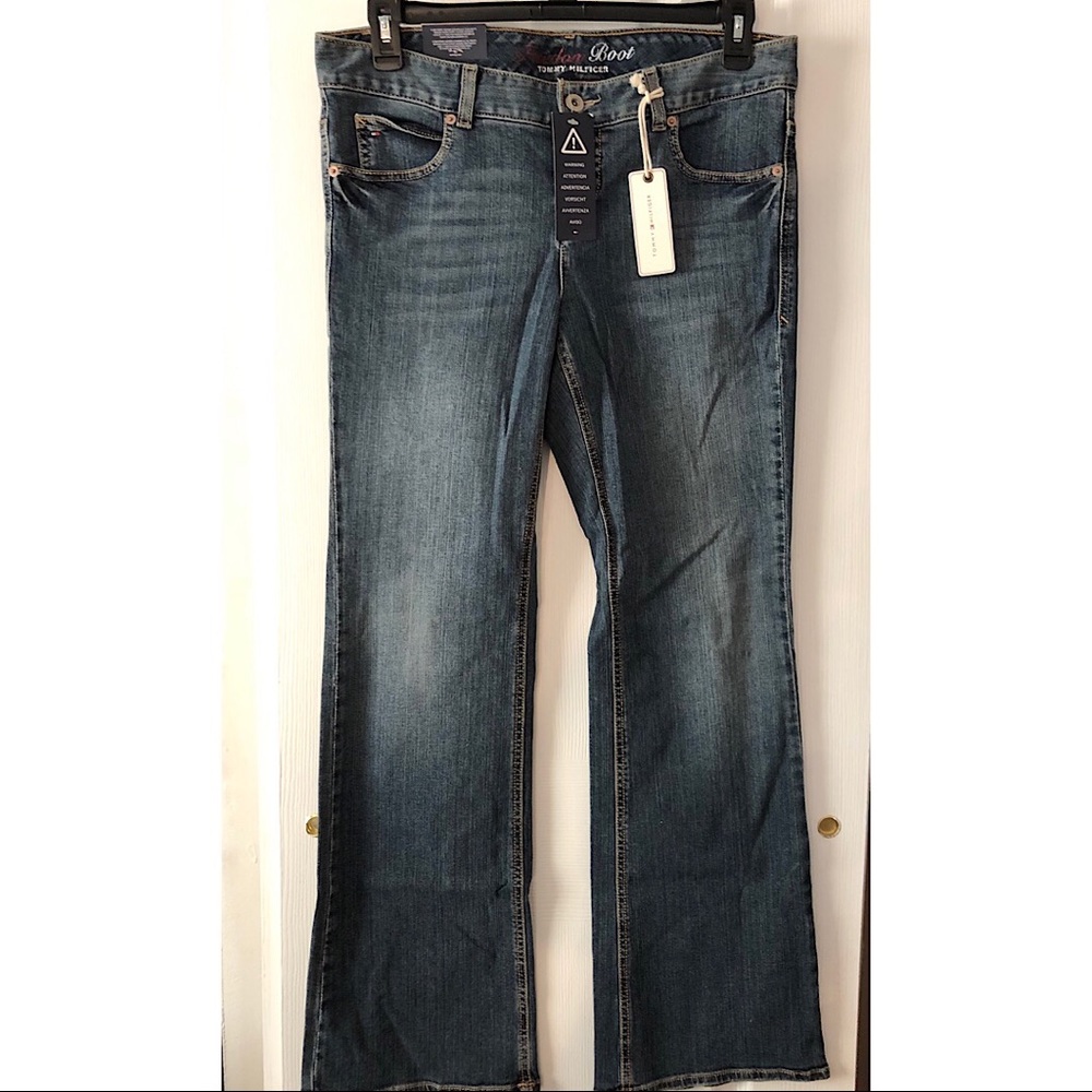 Tommy Hilfiger medium wash boot cut jeans.